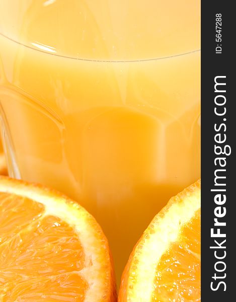 Close up of orange juice and orange fruits. Close up of orange juice and orange fruits