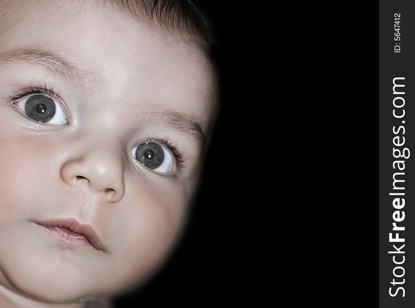 Close up shot of a baby boys face