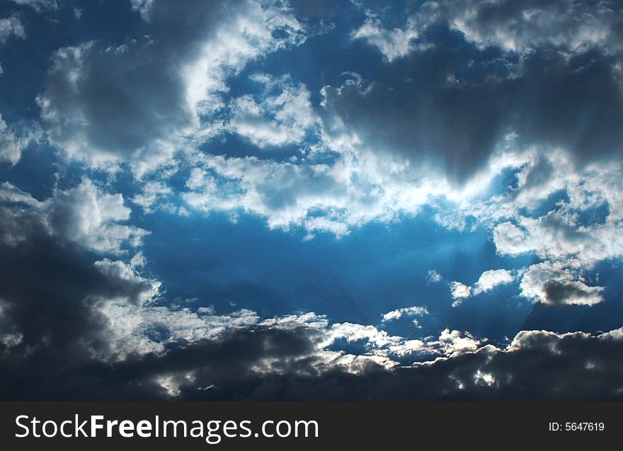 Evening cloudy sky with rays of light. Evening cloudy sky with rays of light