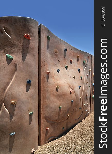 Climbing wall installation in play area of new community park in Gilbert, AZ