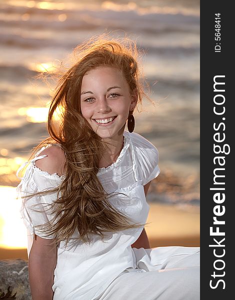 Beautiful young girl relaxing on the beach