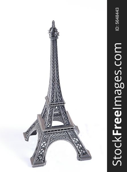 An Eiffel Tower isolated in white.  Photographed in a studio. An Eiffel Tower isolated in white.  Photographed in a studio.