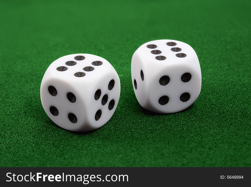 Two dices on green surface. Two six. Symbol of success