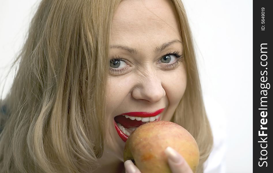 Beautiful Smiling Women Eating Apple