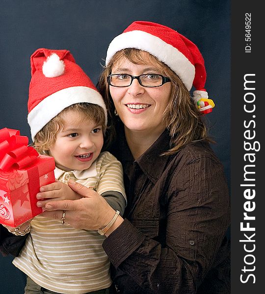 Small family with christmas present