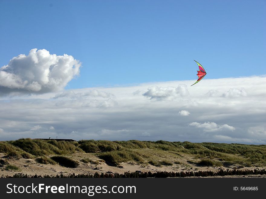 Flying Kite on the blue Sky