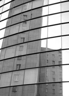 Buildings Reflected In Mirror Glass Stock Images