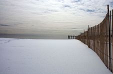 Pier At Shore In Winter With Gloomy Sky Royalty Free Stock Photography Pier At Shore In Winter With Gloomy Sky Royalty Free Stock Photography