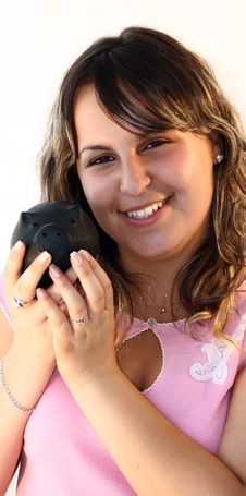Young Lady Holding Piggy Bank Stock Image