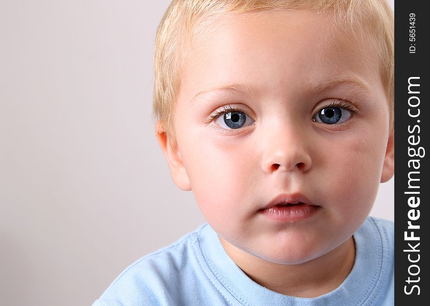 Beuatiful Blond toddler with big blue eyes. Beuatiful Blond toddler with big blue eyes