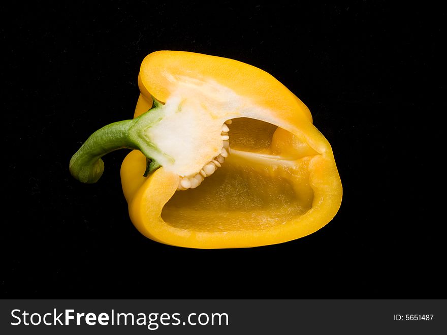 Beautiful pimiento on black background, studio style. Beautiful pimiento on black background, studio style