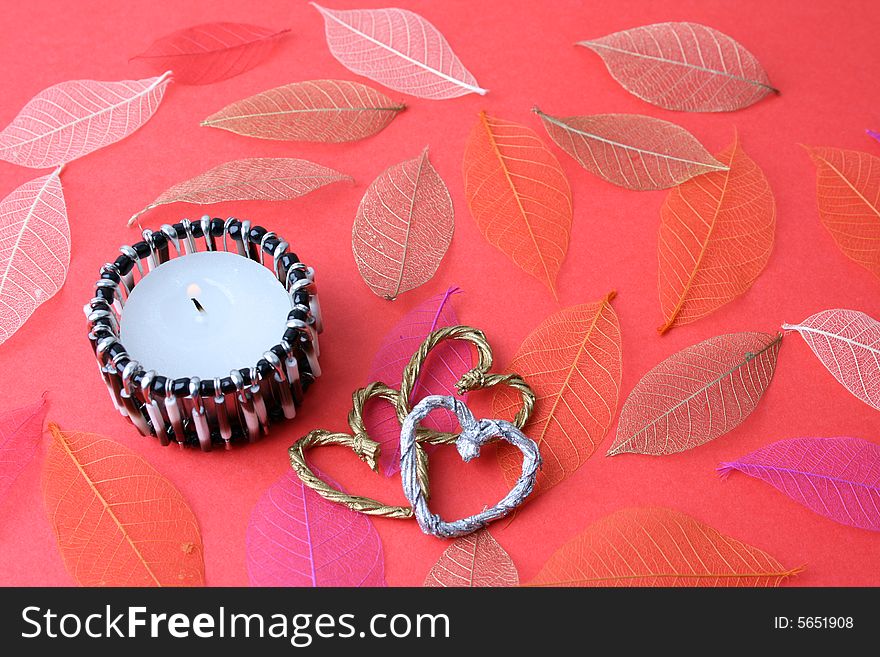 Ethnic Candle holder with autumn leaves and hearts. Ethnic Candle holder with autumn leaves and hearts