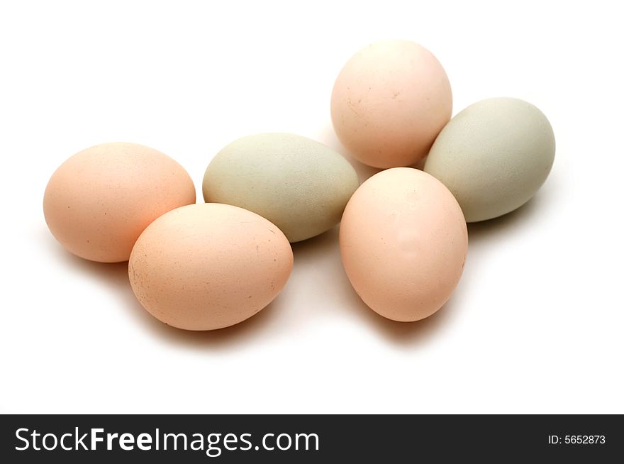Home eggs from village on white background