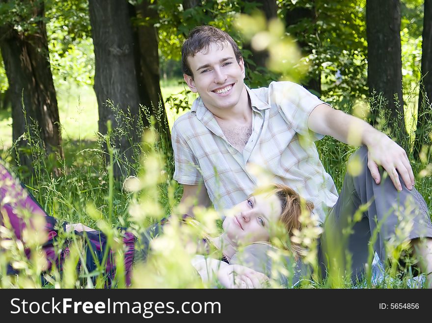 Man and woman relaxing in the park. Man and woman relaxing in the park