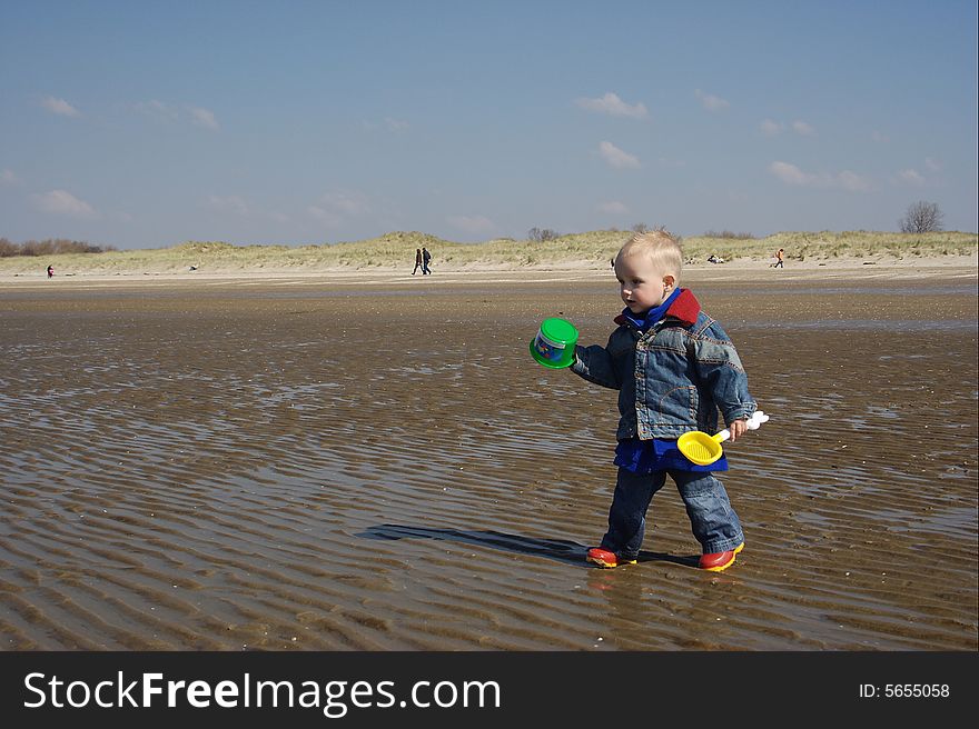 Little boy playingon the beach. Little boy playingon the beach