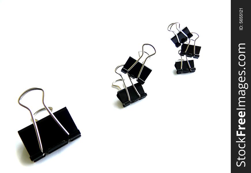 Office binder clips isolated on the white. Office binder clips isolated on the white