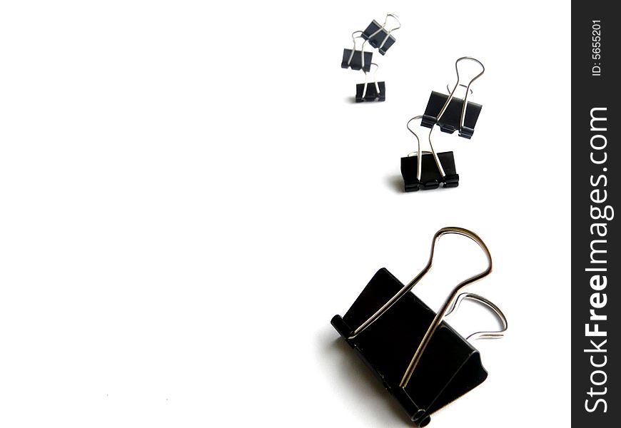 Office binder clips isolated on the white. Office binder clips isolated on the white