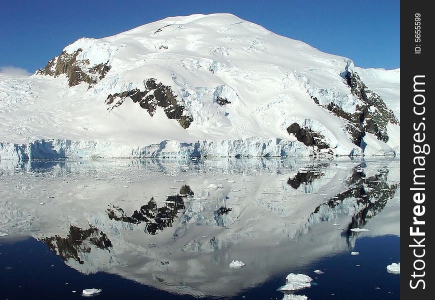 Reflection of icebergs, Sunny day in Antarctica. Reflection of icebergs, Sunny day in Antarctica