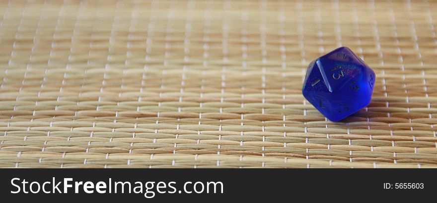 BLUE DICE ON THE MAT