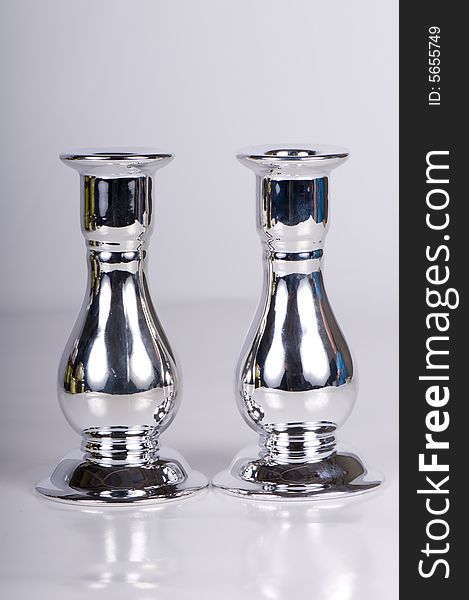 A set of pair shaped pewter candle sticks.