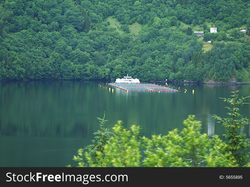 Floating Fish farm on the water. Norway. Floating Fish farm on the water. Norway