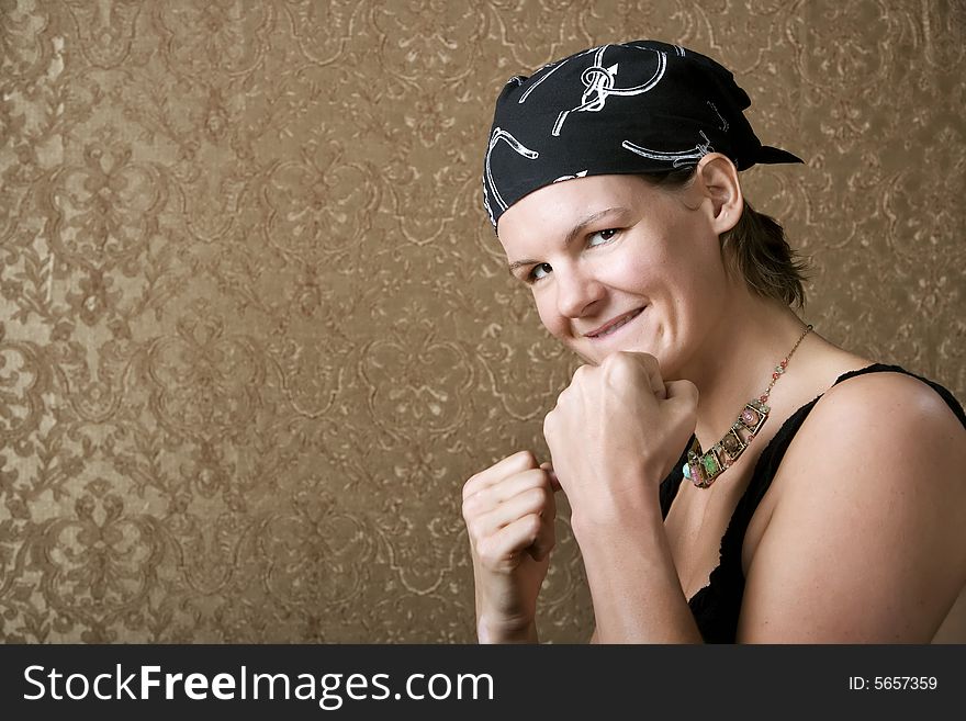Pretty Boxing Woman Wearing a Bandana on Her Head