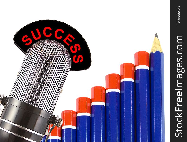 Success message on vintage microphone with graph of pencils in background. This image conveys the concept of financial success in business.