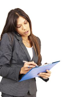 Beautiful Brunette Woman Holding A Clipboard Stock Photo Beautiful Brunette Woman Holding A Clipboard Stock Photo