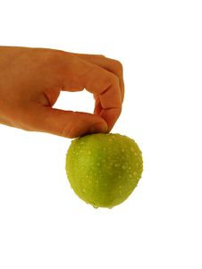 Green Apple At Hand Royalty Free Stock Photography Green Apple At Hand Royalty Free Stock Photography