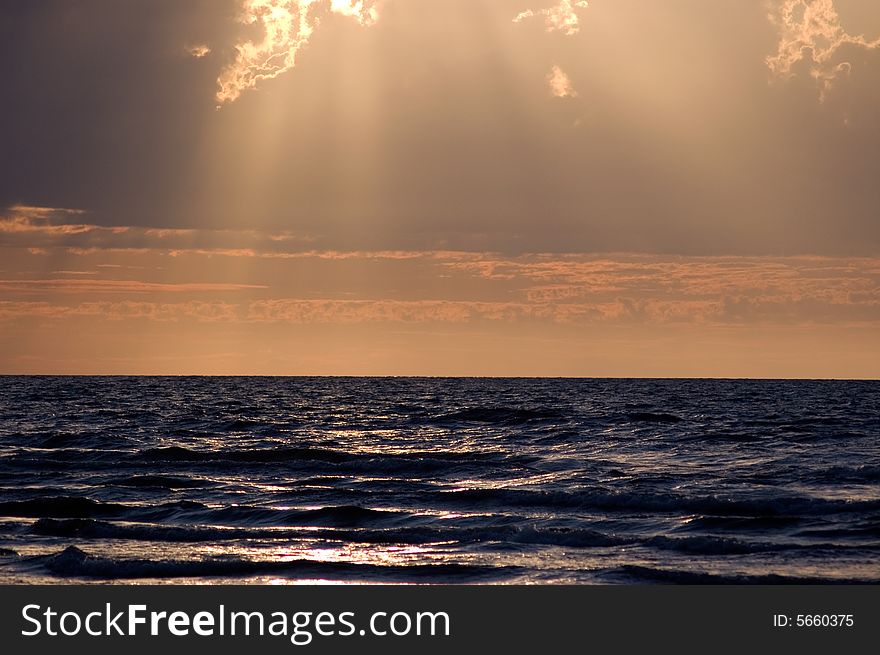 The sea, a solar beams