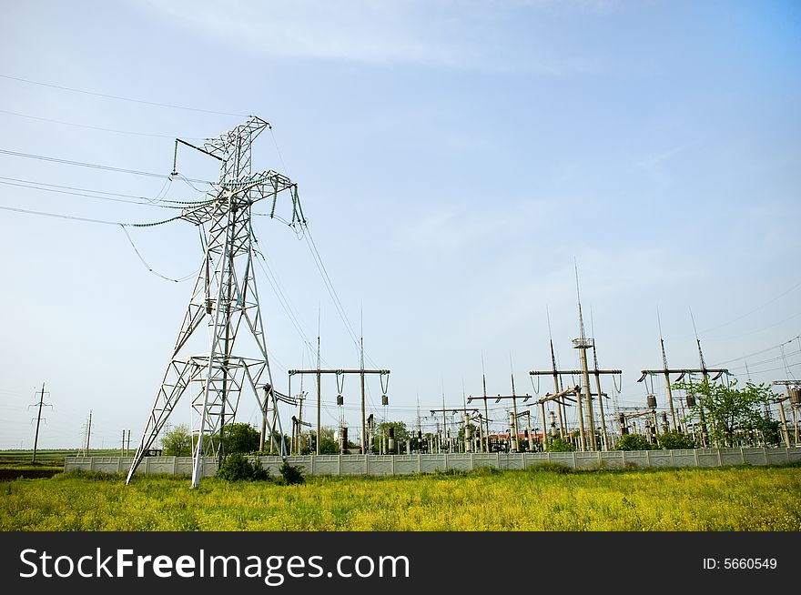 Electrical Towers On Blue Sky Background