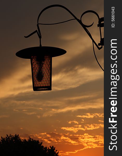 Sunset With Lamp Silhouette