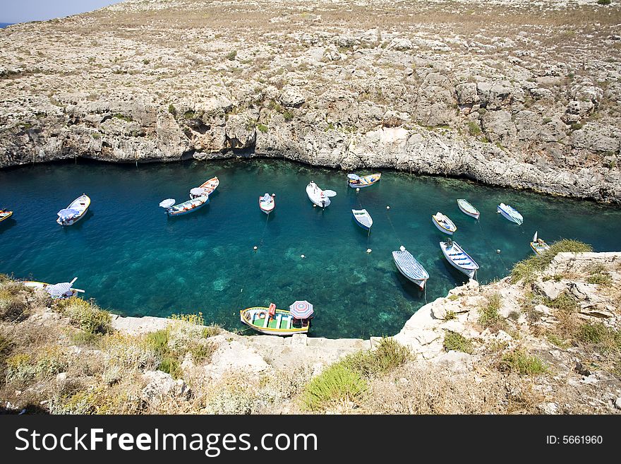 Little boats in clear water bay. Little boats in clear water bay