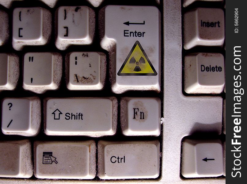 Radiation special  key on a dirty keyboard. Radiation special  key on a dirty keyboard