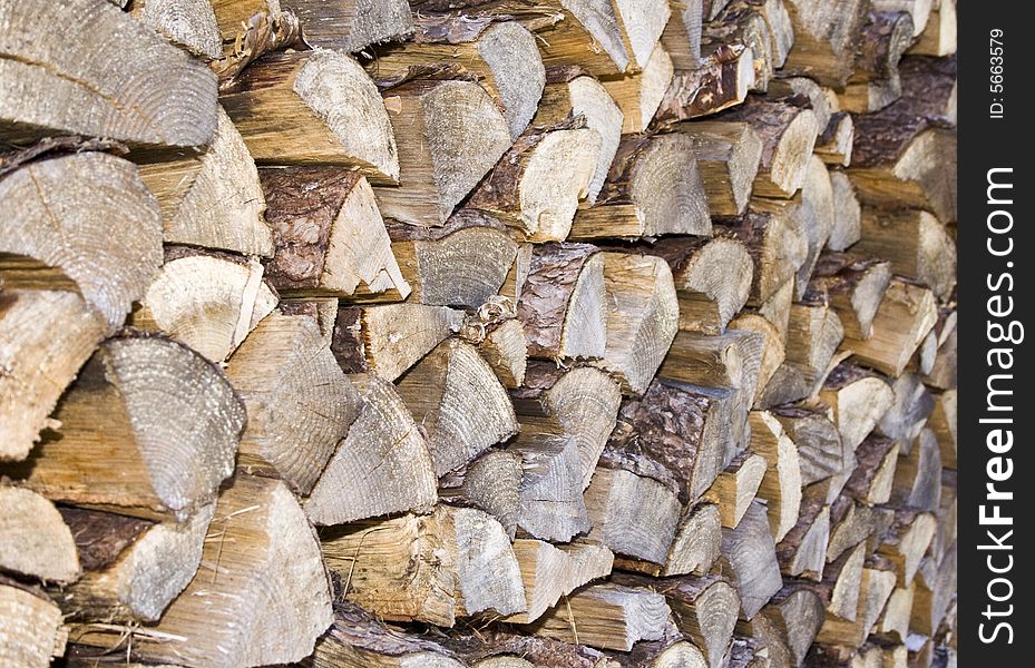 Stack of wood on a farm drying to be used in winter