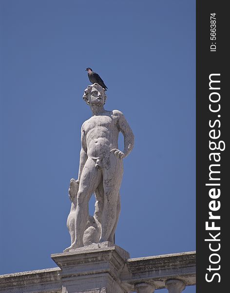 Statue on the Biblioteca Nazionale Marciana. Taken in Venice, Italy.