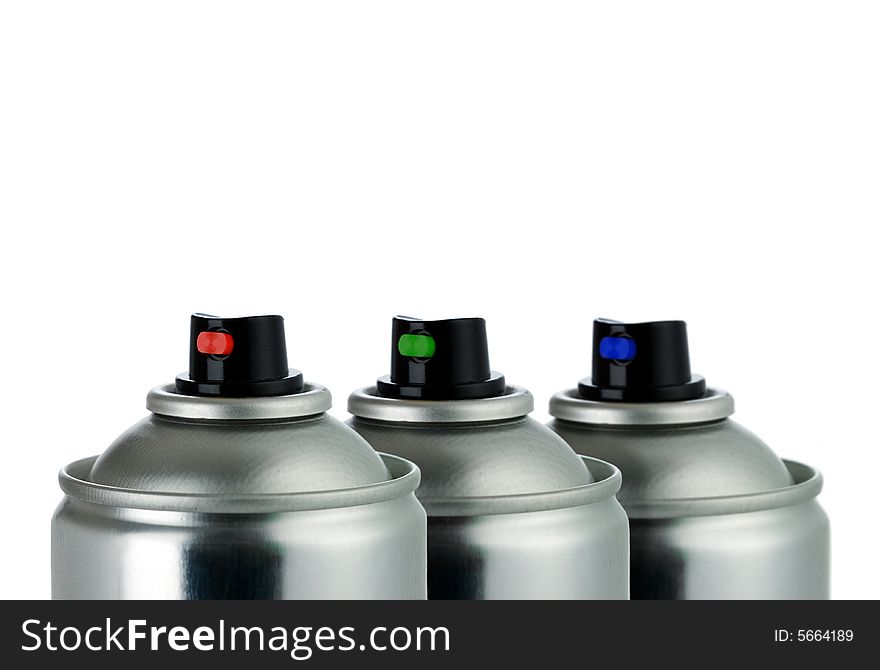 Detail of three aerosol cans RGB isolated on white