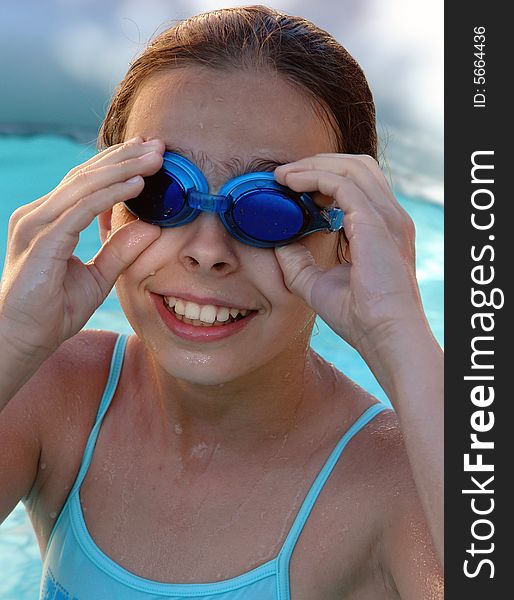 The swimmer with water glasses.