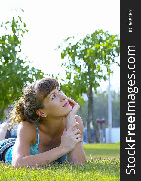 Portrait of young beautiful woman  in summer environment