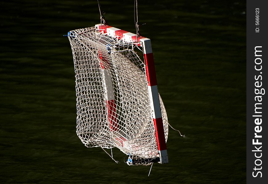 A net for handball hanged upon the river Arno