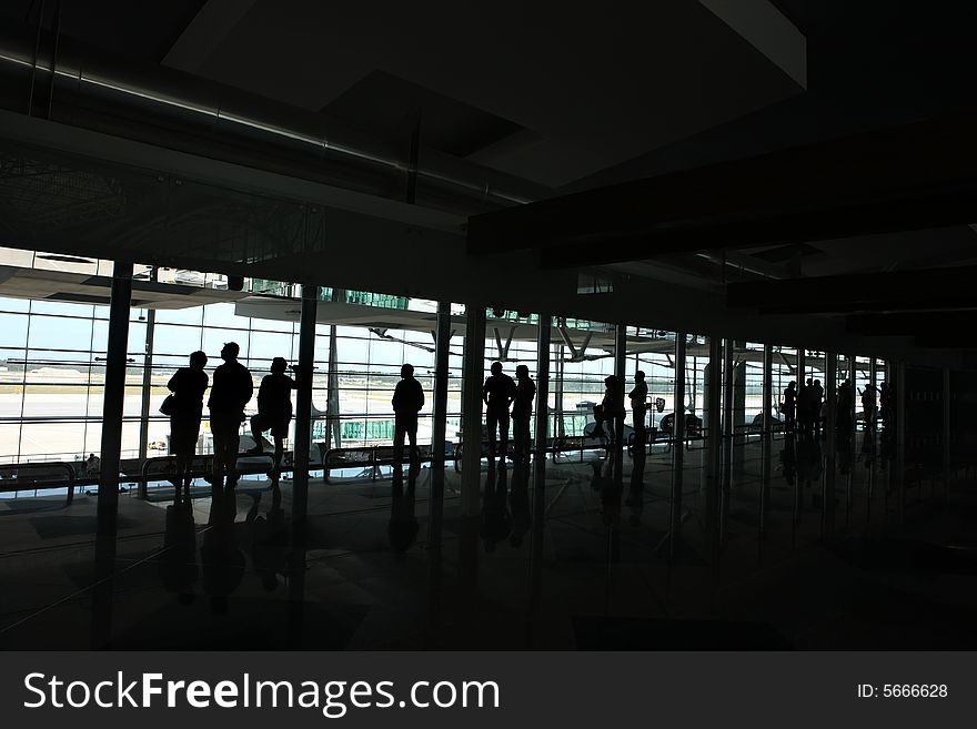 People waiting in the airport. People waiting in the airport