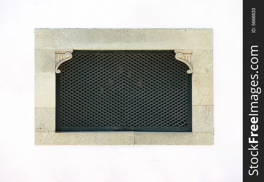 Wine cellar window with stone and iron