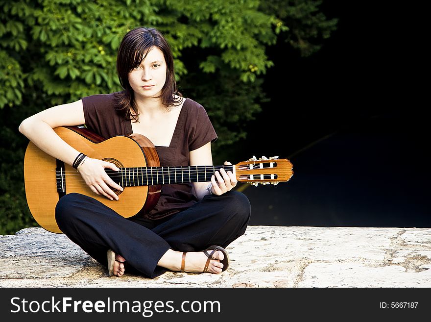 Young woman with guitar