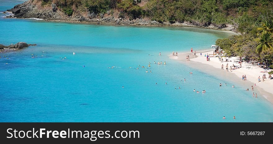 Bathers enjoy warm Caribbean waters. Bathers enjoy warm Caribbean waters.