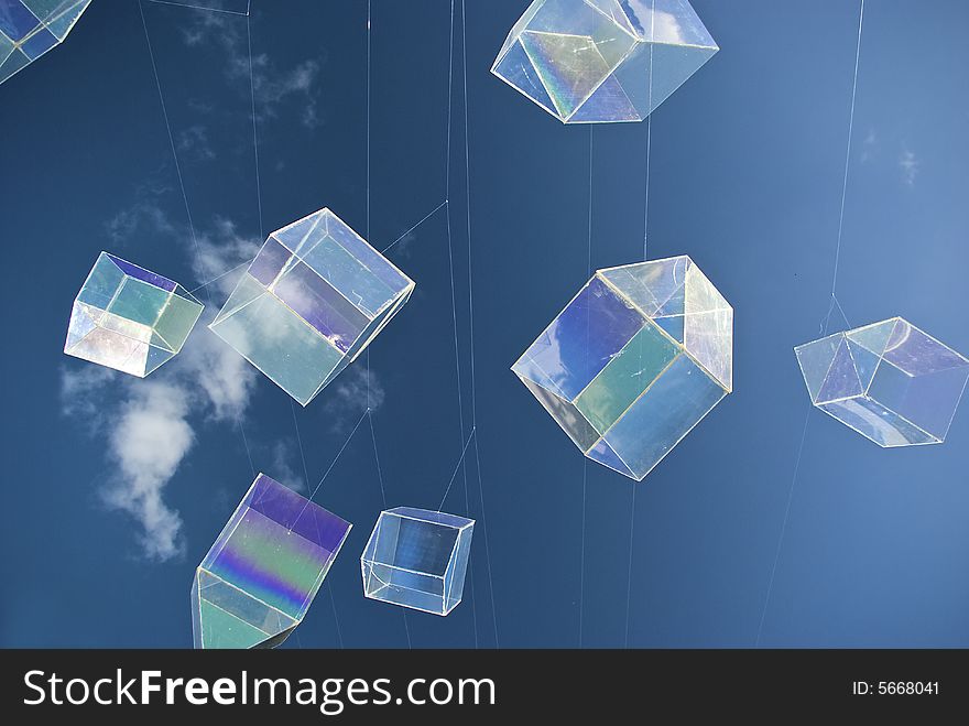 Installation art piece with floating perspex houses suspended on wire to look like polygonal soap bubbles. Installation art piece with floating perspex houses suspended on wire to look like polygonal soap bubbles
