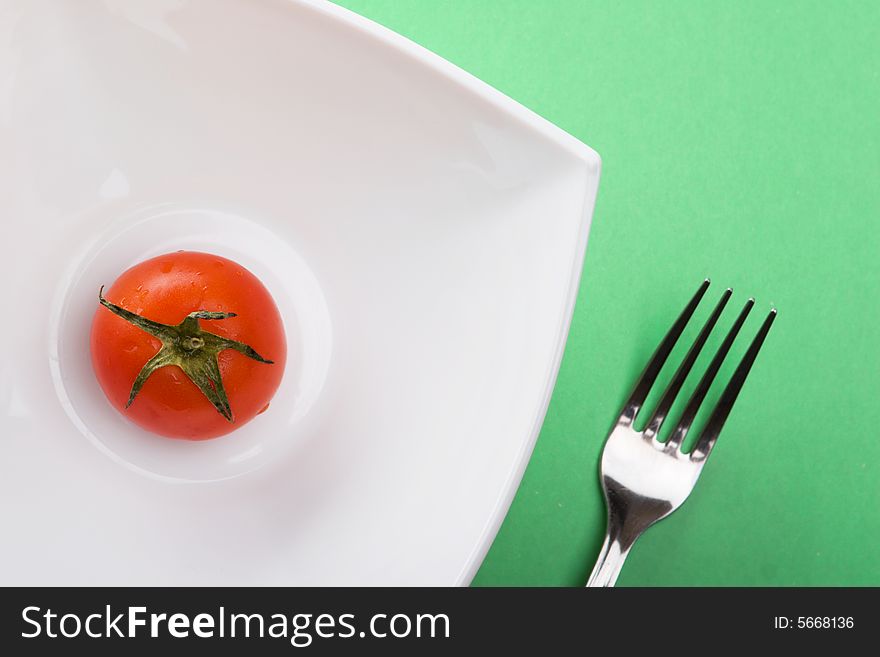 Fresh tomato in white dish. Fresh tomato in white dish