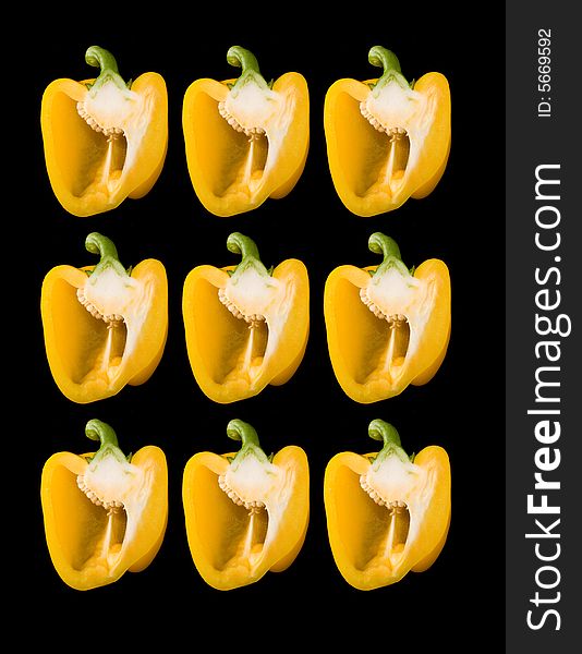 Many Beautiful dissected pimiento on black background, studio style. Many Beautiful dissected pimiento on black background, studio style