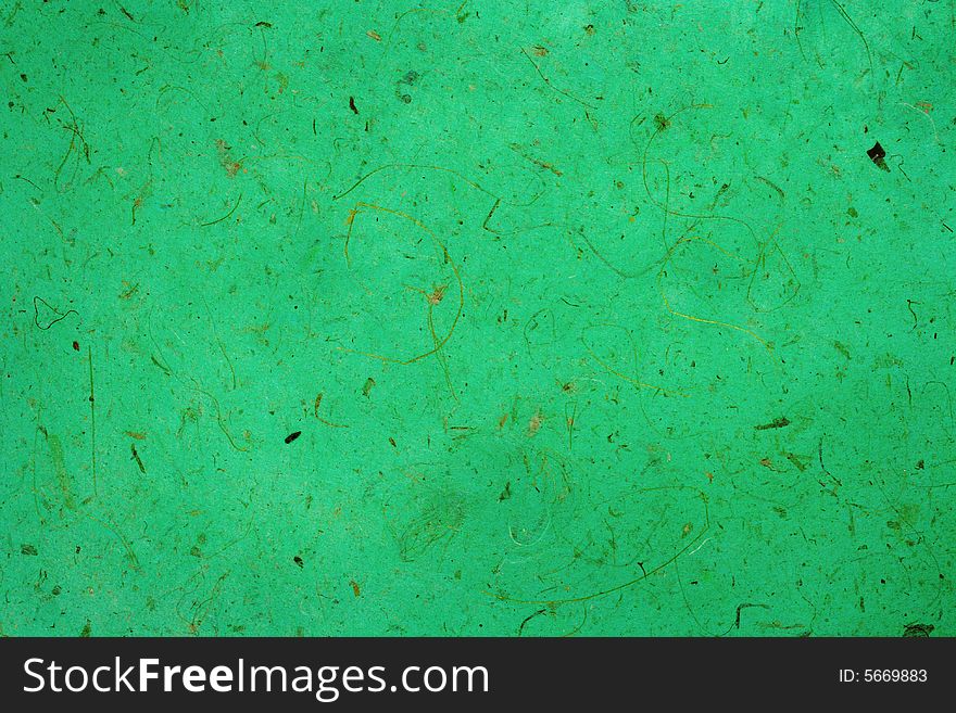 Green paper texture, close-up