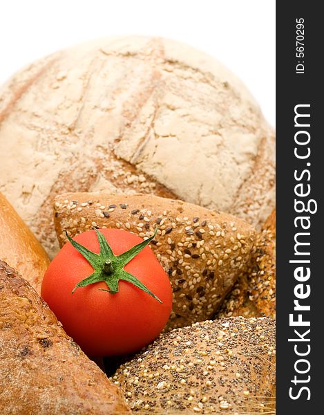 Red tomato on bread background