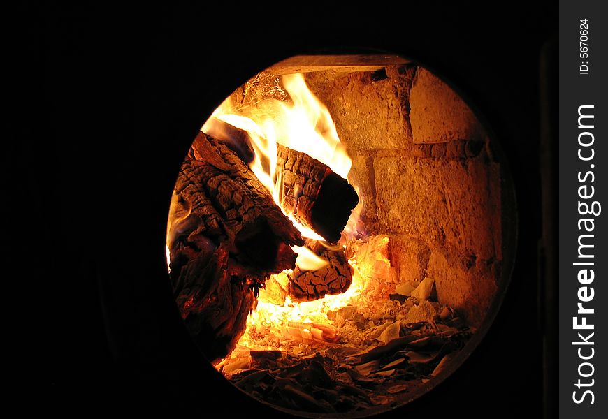 Burning fire in old stove. Burning fire in old stove